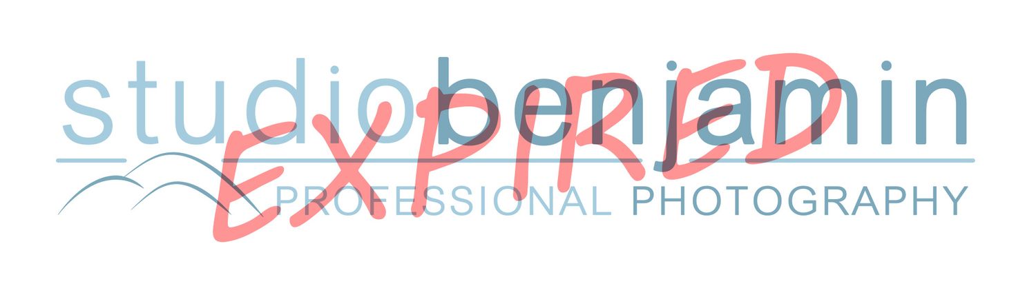 A professional photography studio logo in light blue and red with minimalist text design.