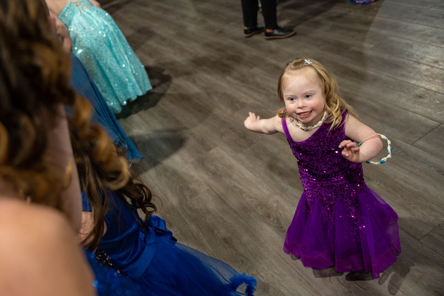 Gigi's Playhouse 2025 Gala event photo little girl in a purple mermaid dress