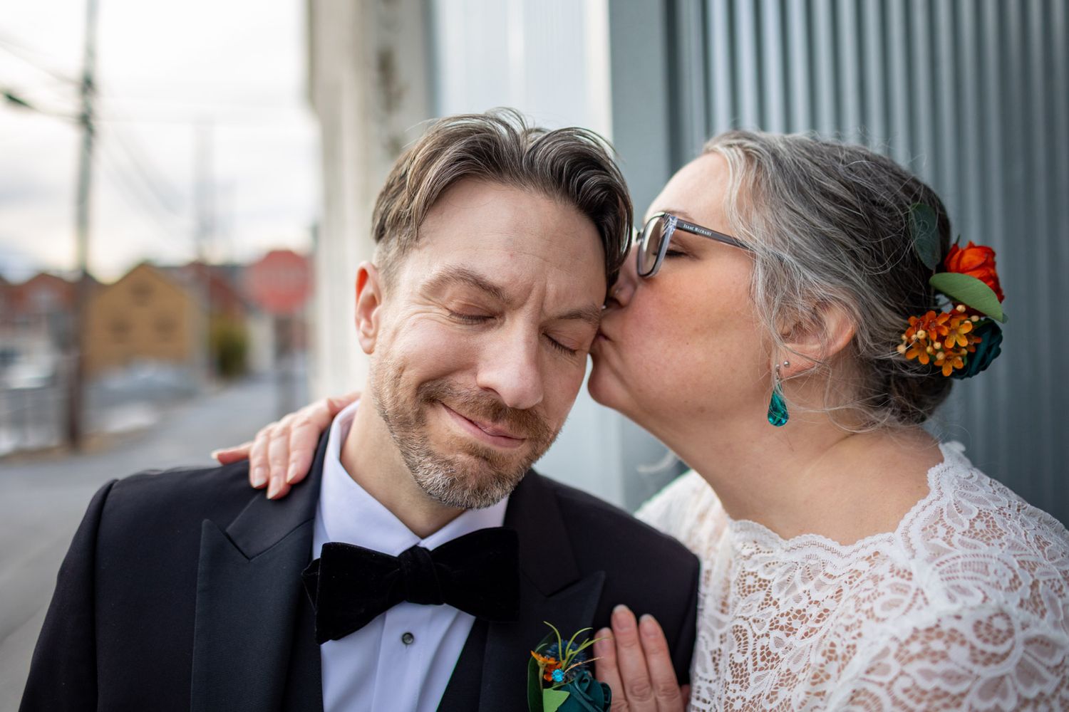 bride and groom in an alley