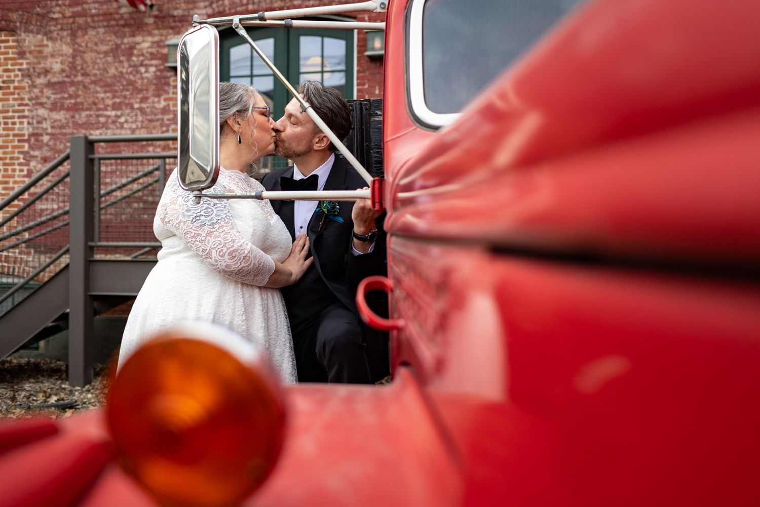 red fire truck photo of bride and groom at the Barrel House in Chambersburg