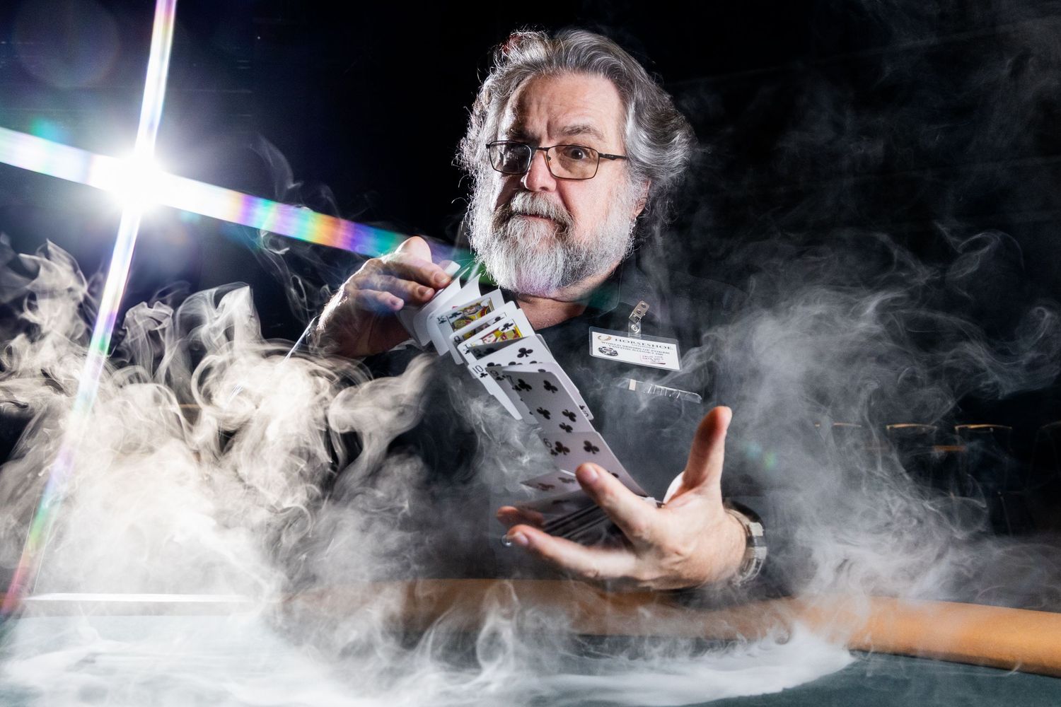 A series of grey smoke photographs captured in sequence showing billowing clouds against dark backgrounds.