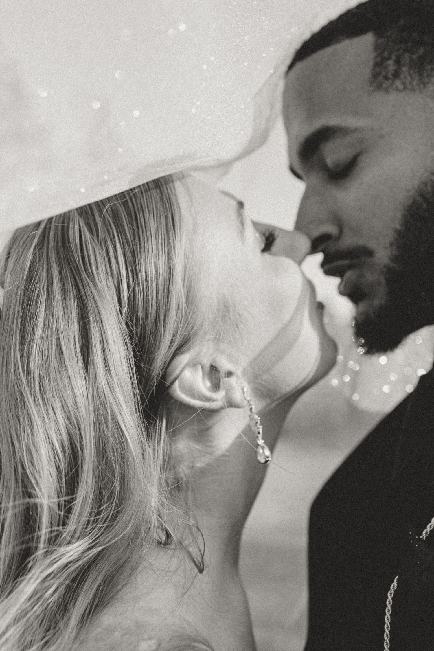 Four romantic black and white photos show a couple sharing intimate, loving moments together in profile view. Dallas/DFW