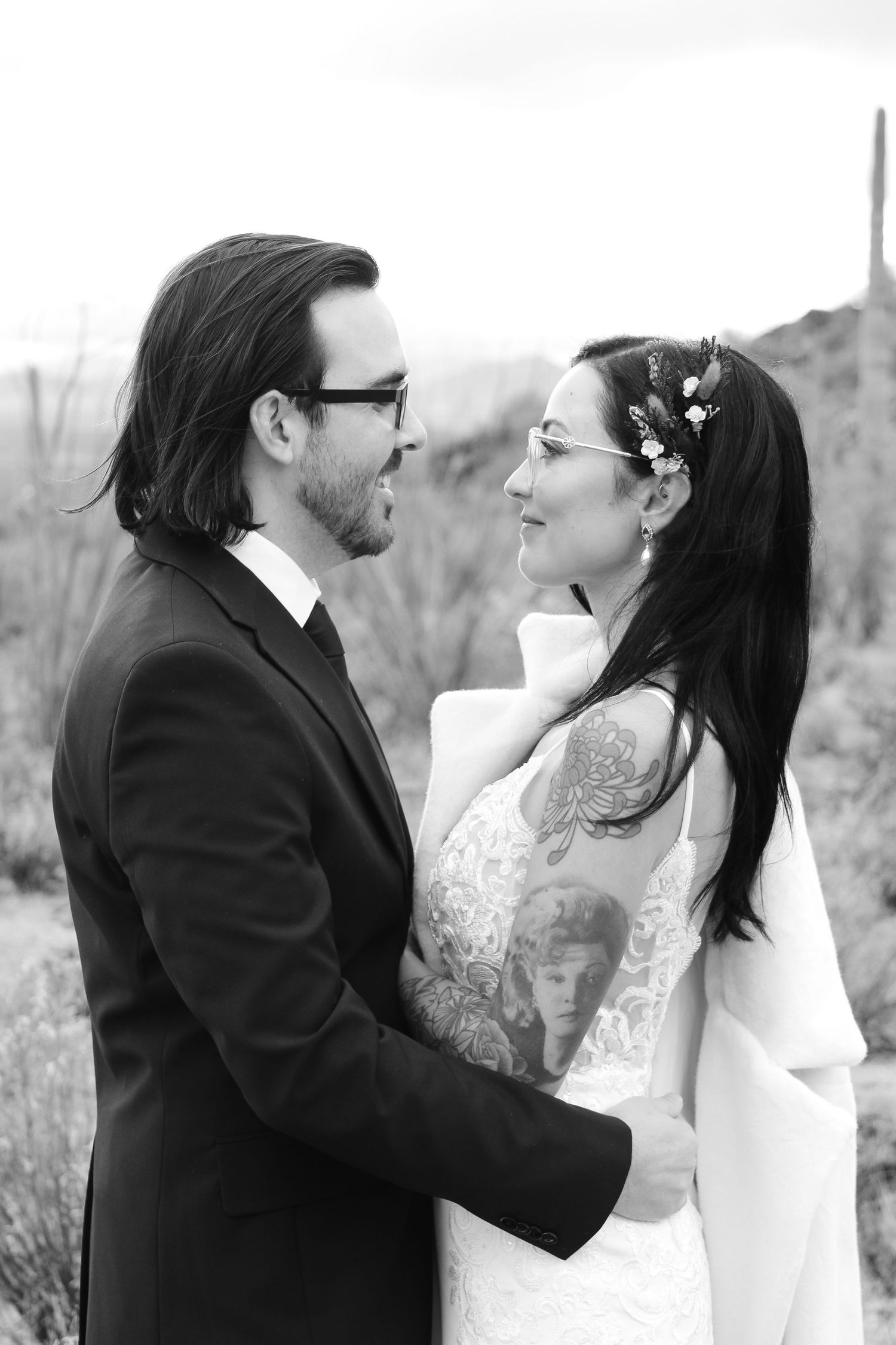 Black and white wedding portraits showing intimate moments between couple.