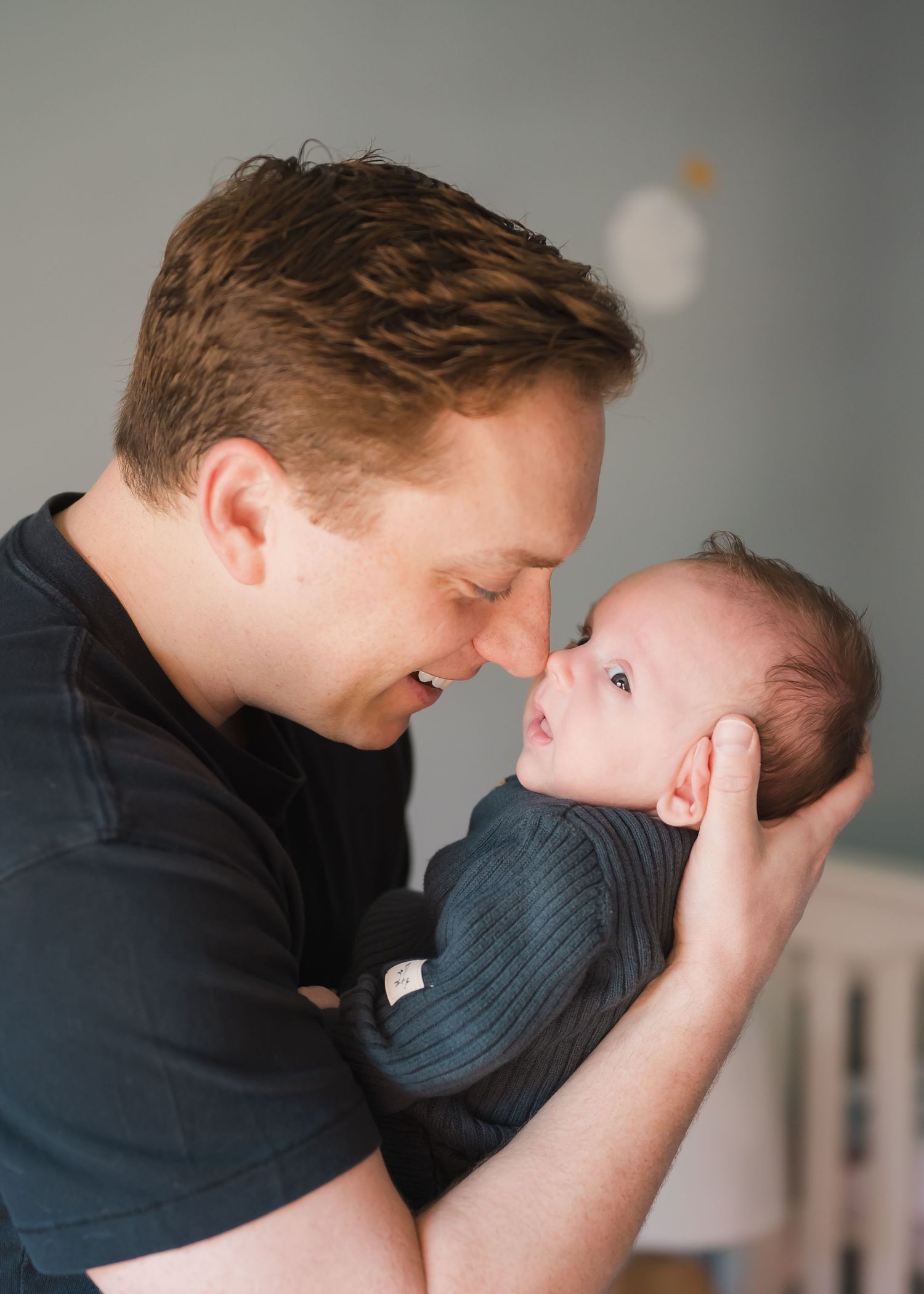 dad hold baby