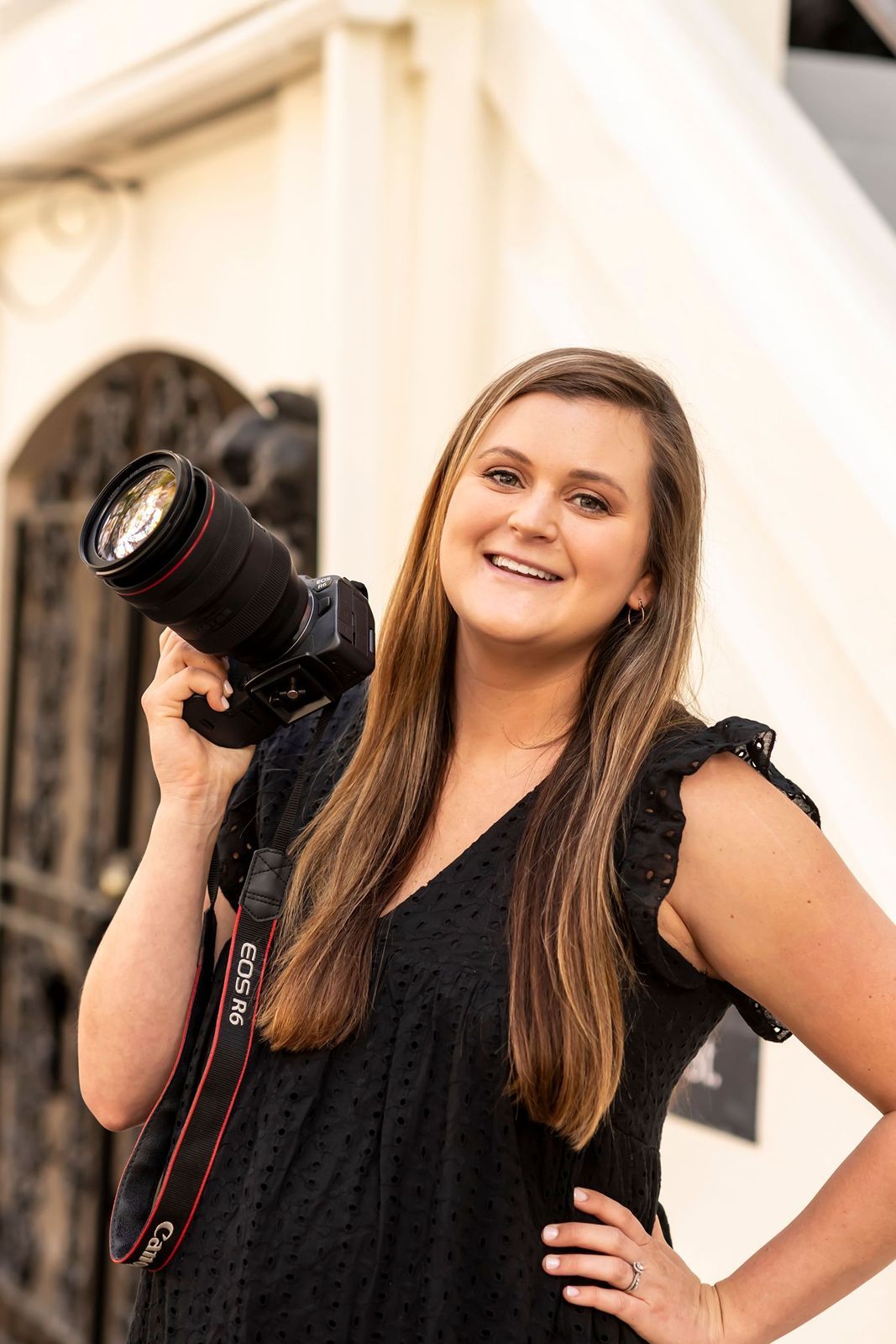 Professional wedding photographer in Low Country SC posing outdoors in historic downtown location