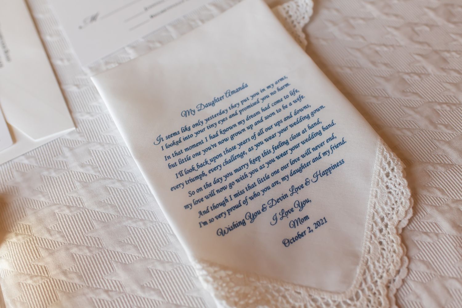 Delicate lace paper doilies arranged in a row with elegant text printed on their surface.