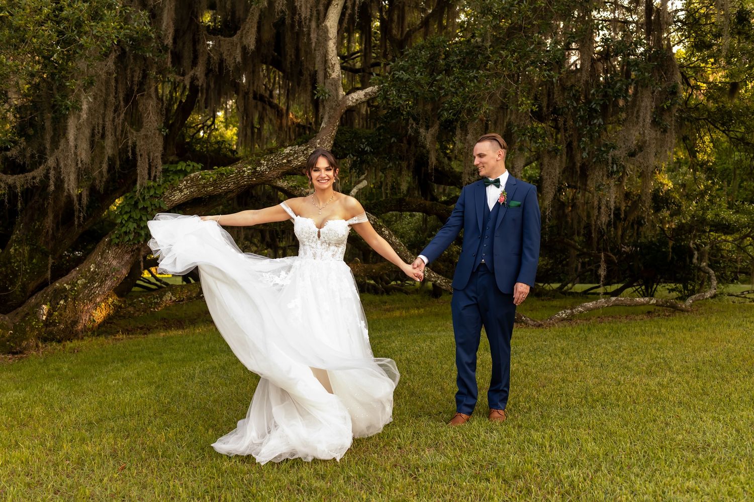 A sequence of wedding photos showing a couple dancing and twirling in a natural outdoor setting with moss-draped trees.
