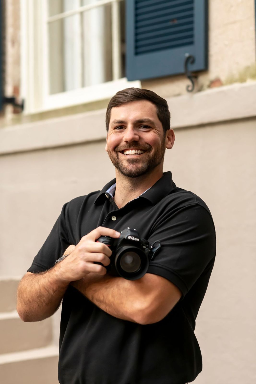 Georgia Low Country wedding photographer Josh posing with camera