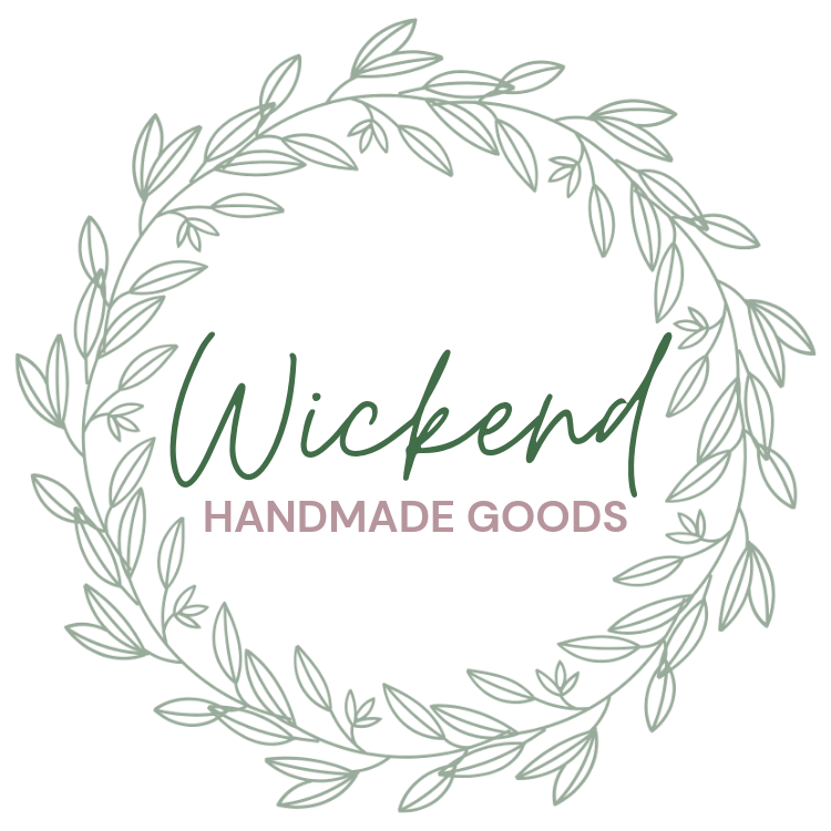 Elegant logo design for Wickend Handmade Goods featuring a delicate sage green wreath with cursive text.