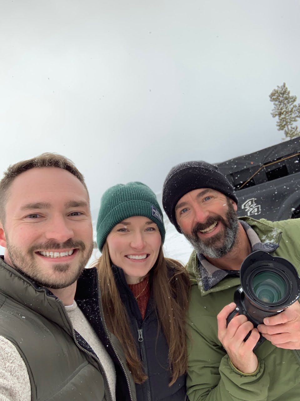 Couple with photographer near Breckenridge, CO after their marriage proposal.