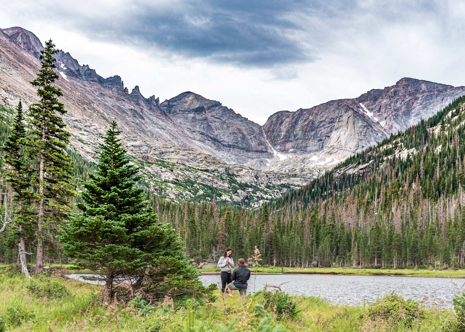 Stunning mountain backdrop for this surprise marriage proposal at Jewel Lake in Rocky Mountain National Park, Colorado.