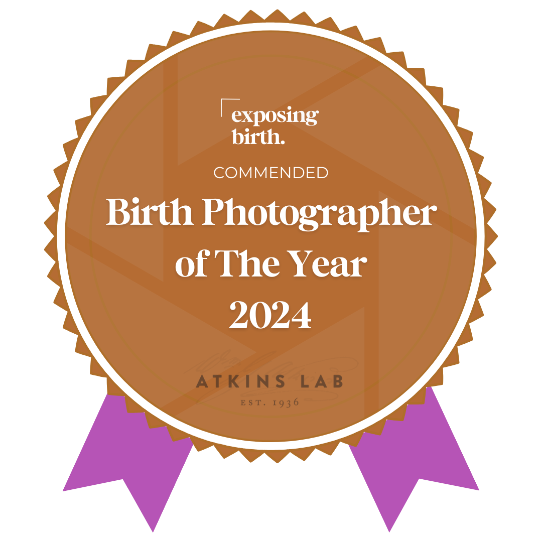 Bronze commended award badge for Birth Photographer of The Year 2024 from Atkins Lab with purple ribbons.