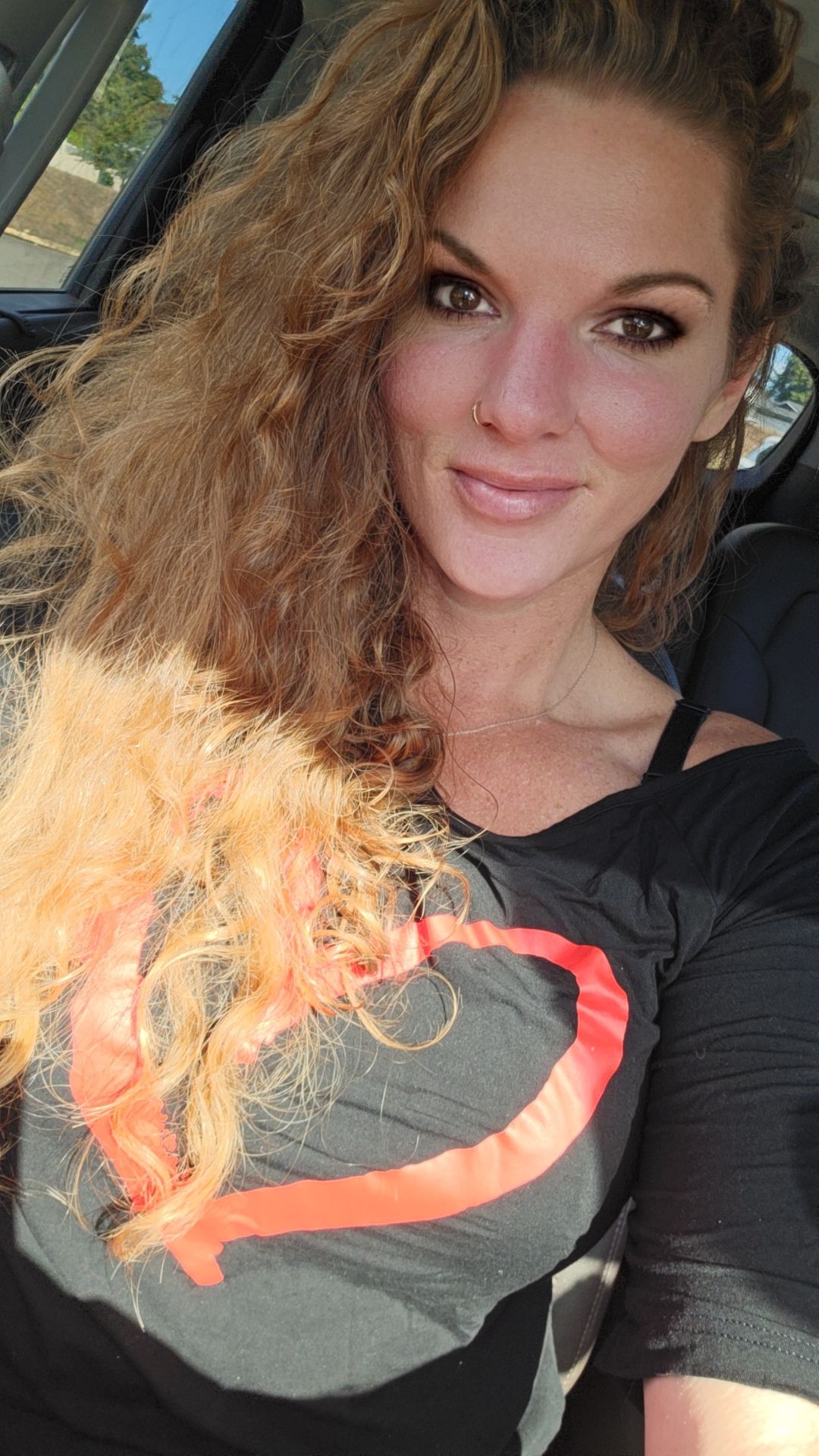 Tall redheaded boudoir photographer.