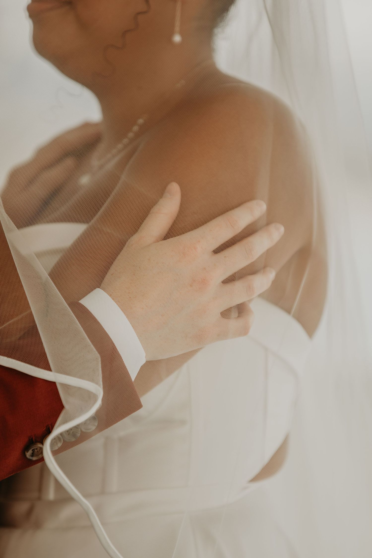 An artistic sequence of ethereal bridal portraits showing delicate tulle veil movement against soft lighting.