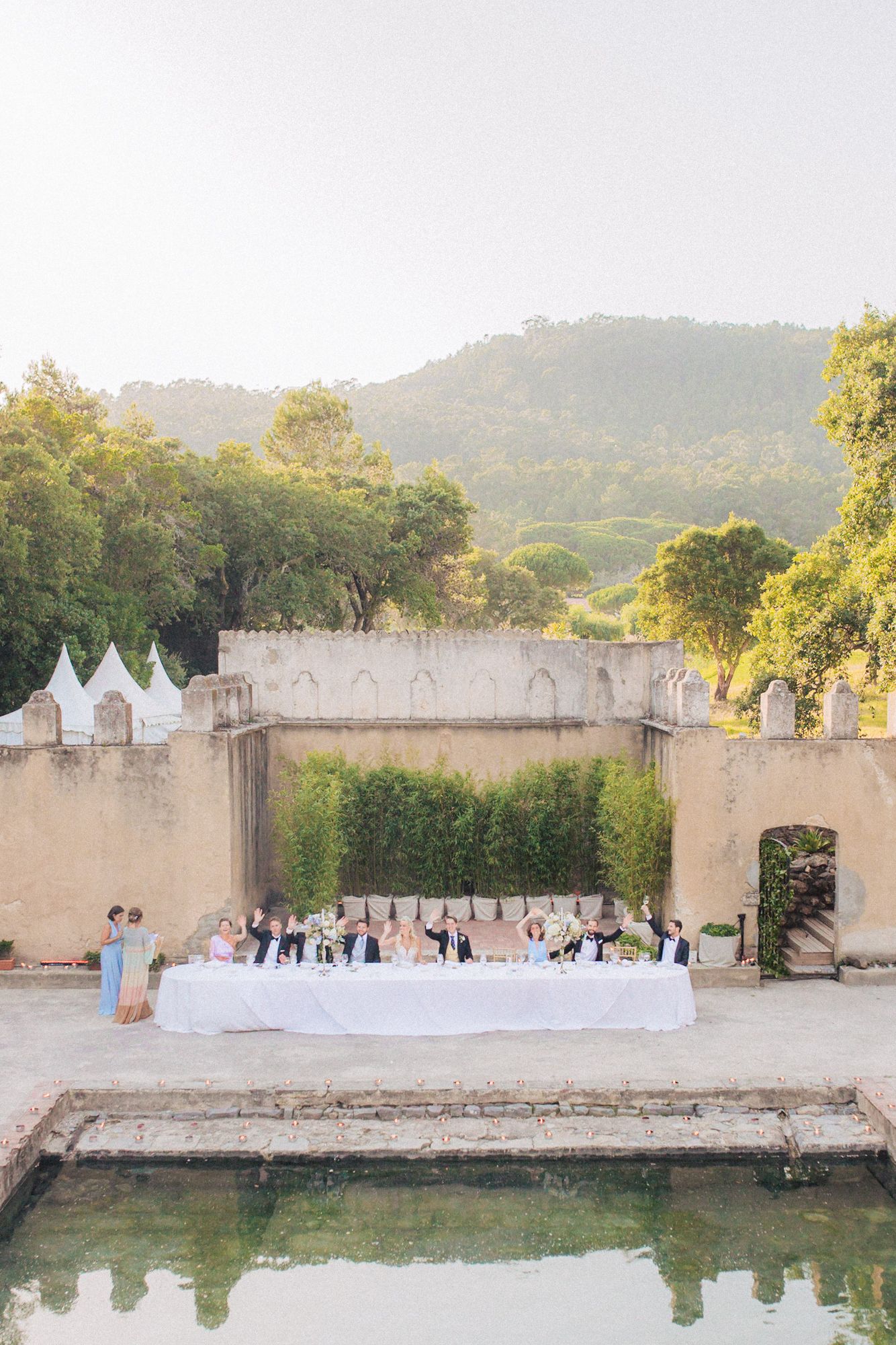Outdoor wedding reception at penha longa, Sintra, Portugal. A timeless moment captured by a Portugal destination wedding photographer.
