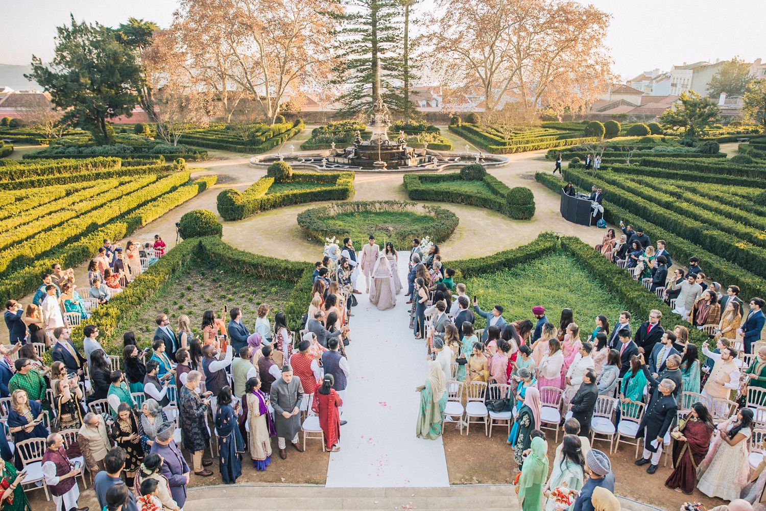 A beautiful Muslim wedding ceremony at the serene Vandelli Botanical Garden, celebrating love at a Destination Indian Wedding in Portugal
