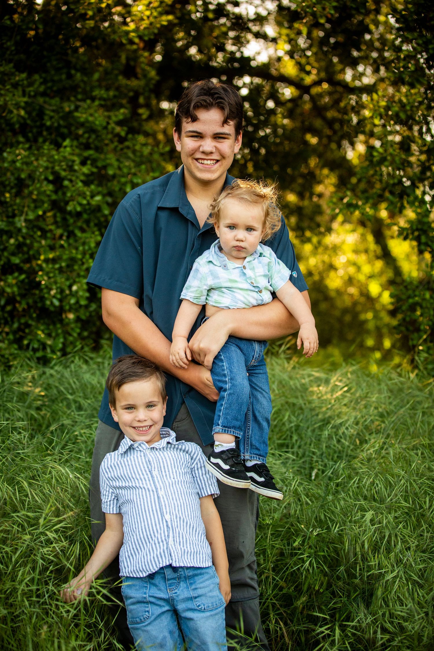 A series of candid outdoor family portraits taken in golden sunlight with natural green foliage in the background.