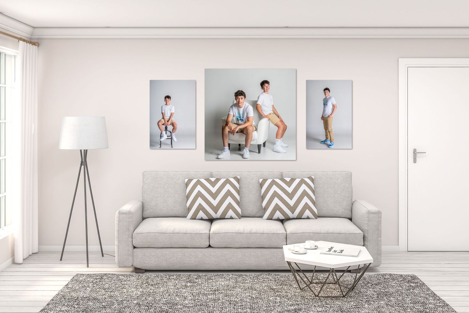 Senior Photographer in Omaha - Modern living room interior with grey couch, chevron pillows and family photo wall display.