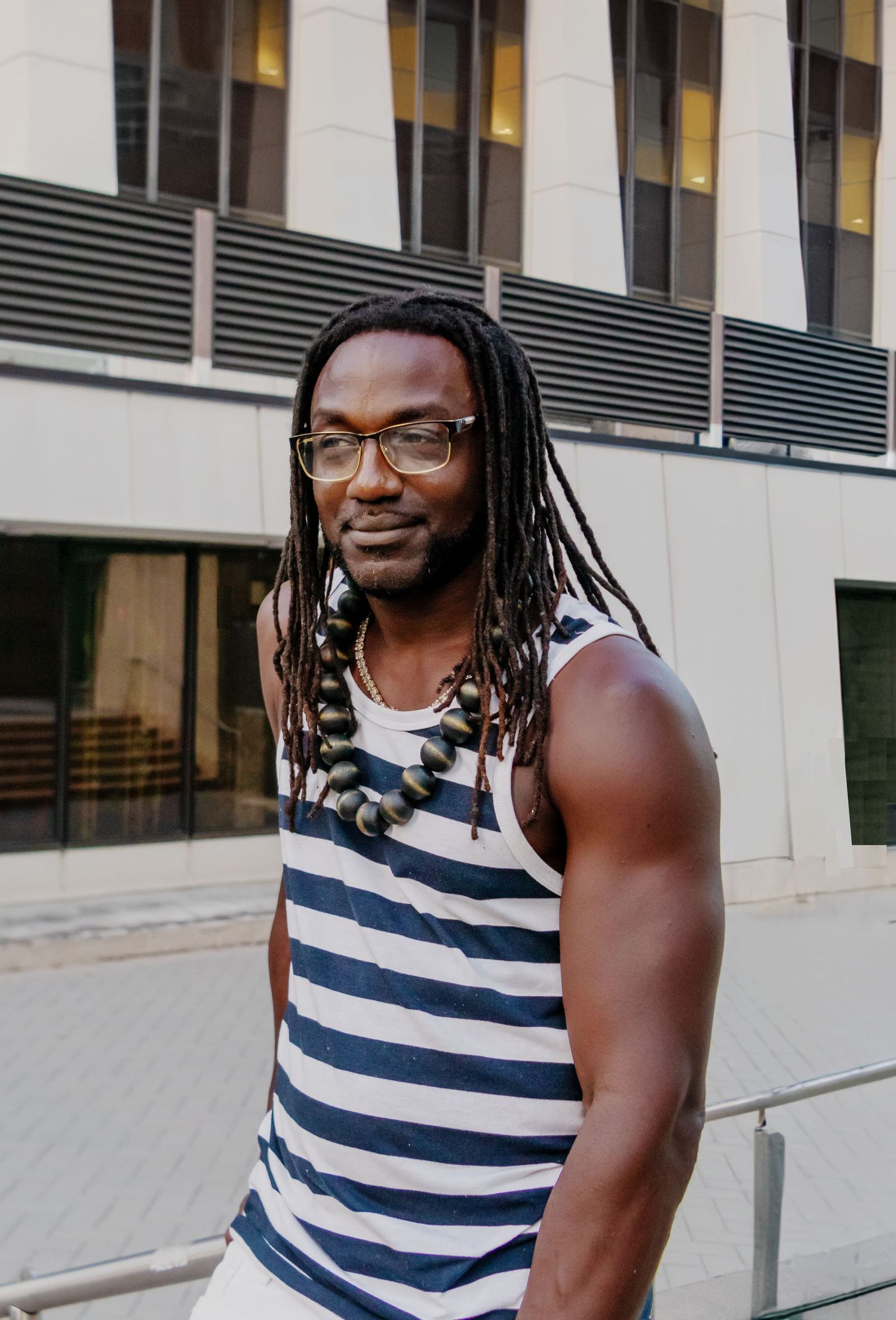 Outdoor portrait of a man in casual clothing with soft background blur