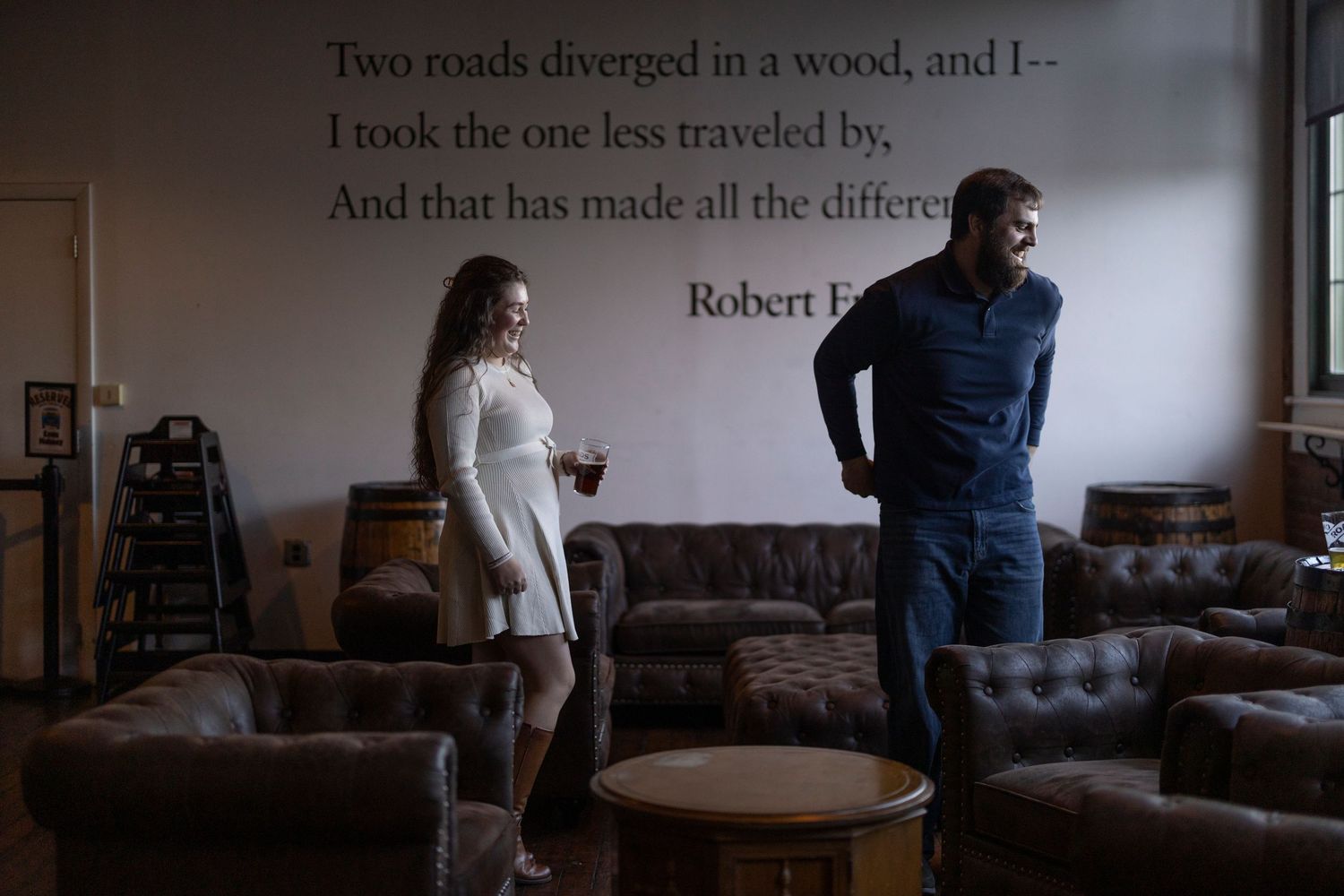 Poem excerpt from 'The Road Not Taken' by Robert Frost displayed in a series of vintage photos and text panels.