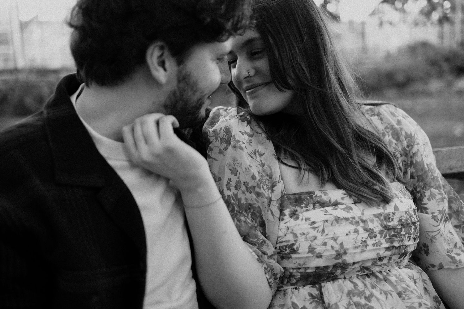 An intimate black and white portrait capturing a tender moment.