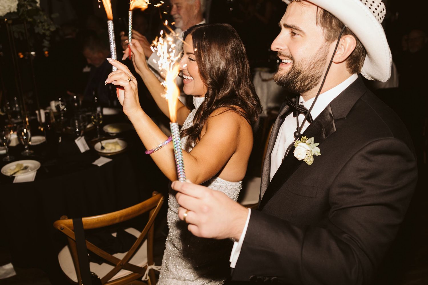 Guests enjoying themselves during an energetic wedding reception celebration.