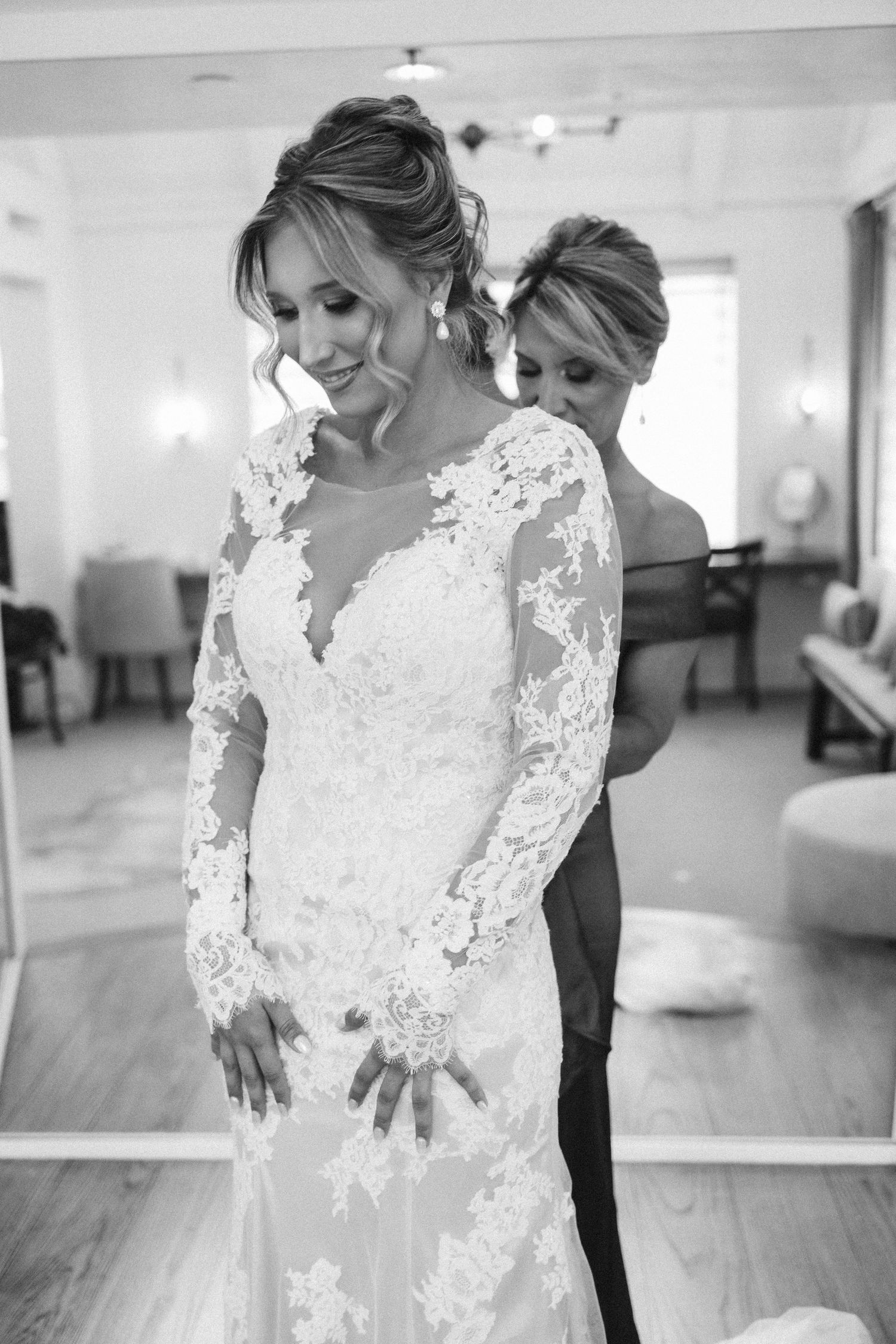 White lace wedding dress details shown in a series of elegant close-up shots.