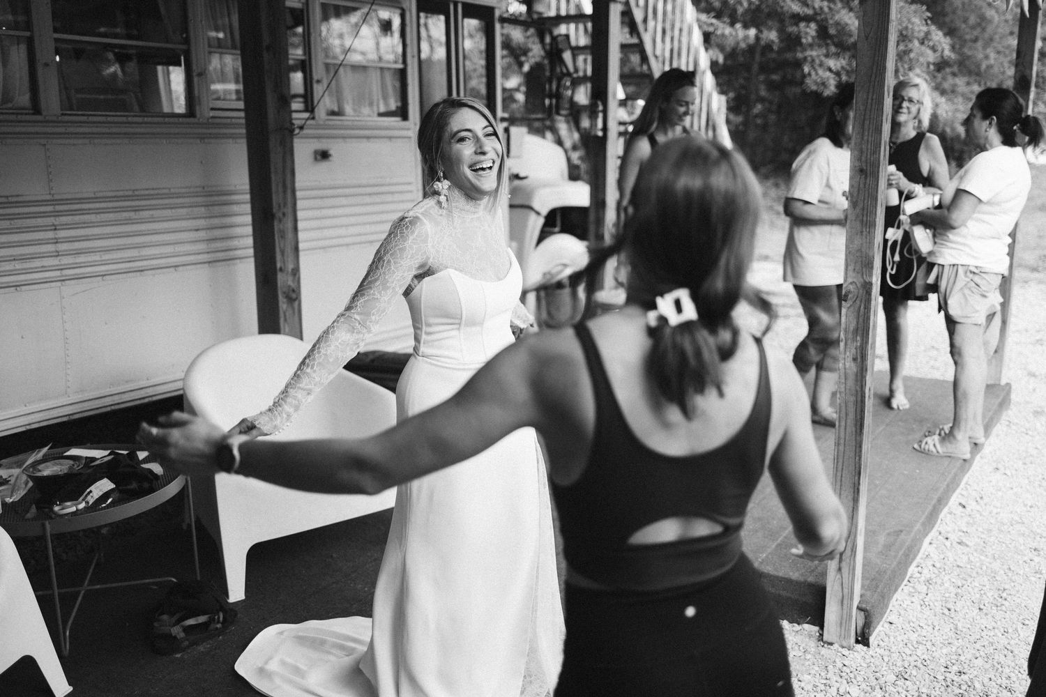 Guests celebrate at a lively reception featuring dancing and candid moments.