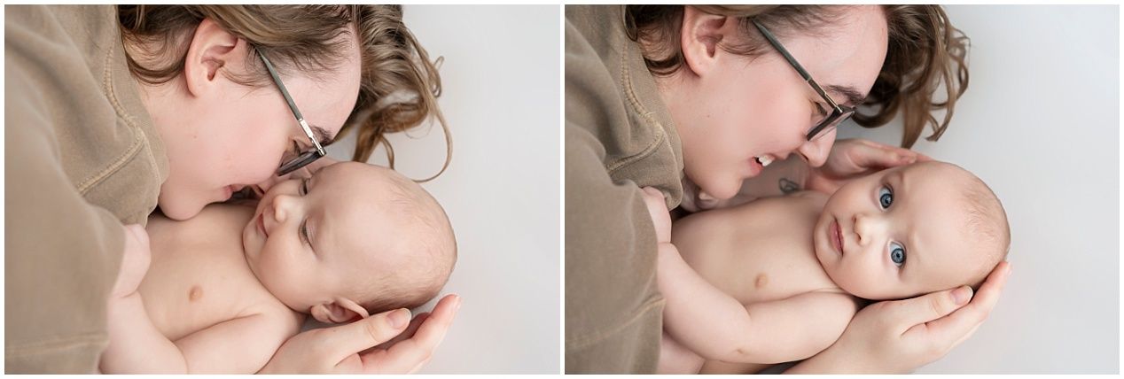 Intimate parent and baby photography session with gentle embraces and natural lighting.