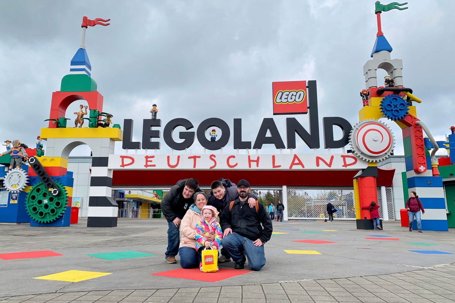 Colorful entrance signage and decorative elements at Legoland Deutschland theme park.