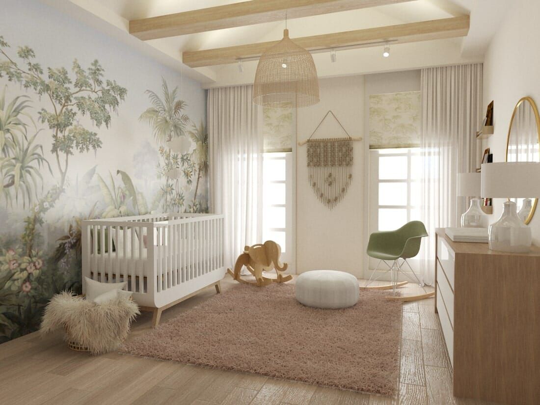 Modern nursery with jungle wall mural, white crib, and natural wood accents.