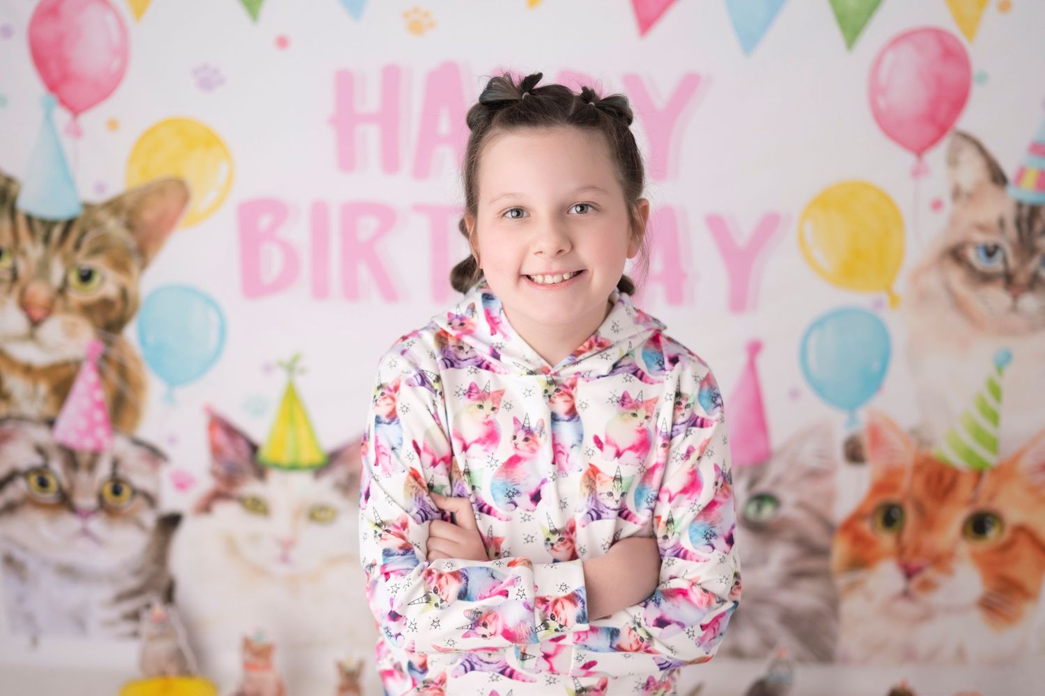 Birthday party scene with colorful balloons and festive decorations as backdrop.