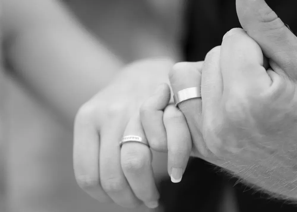 Close-up of wedding rings symbolizing eternal love and commitment.