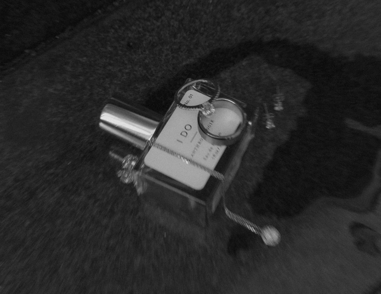 A detailed black and white macro shot of a vintage camera mechanism.