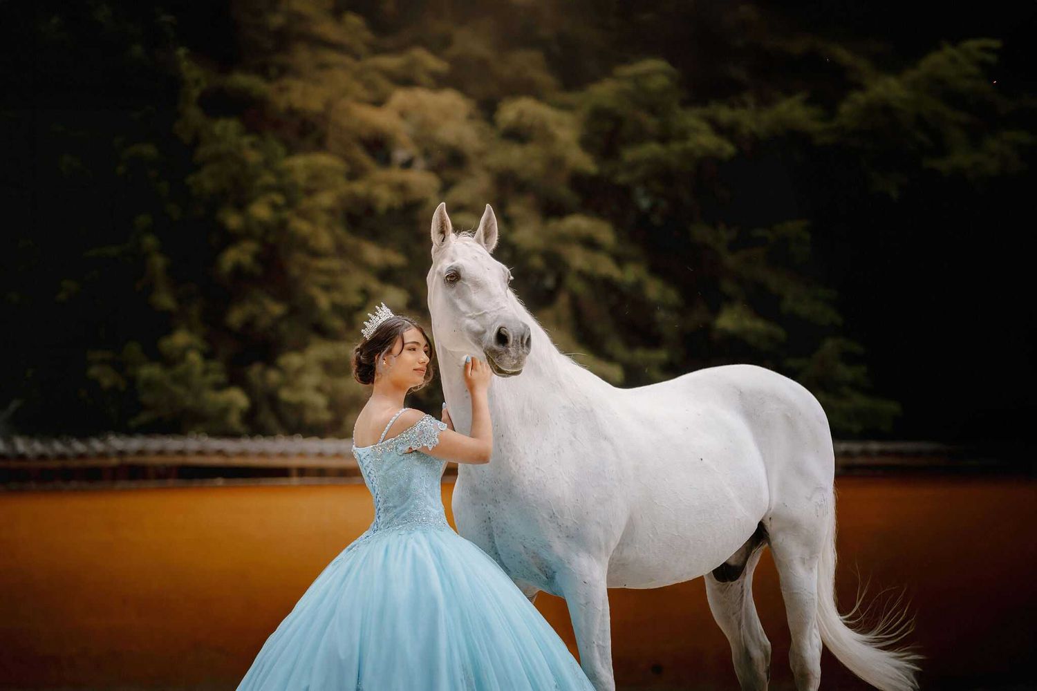 Ethereal scene of a white horse at dusk with dreamy lighting and soft natural backdrop.