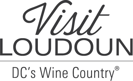 Black and gray logo design for Visit Loudoun tourism brand featuring stylized text and tagline