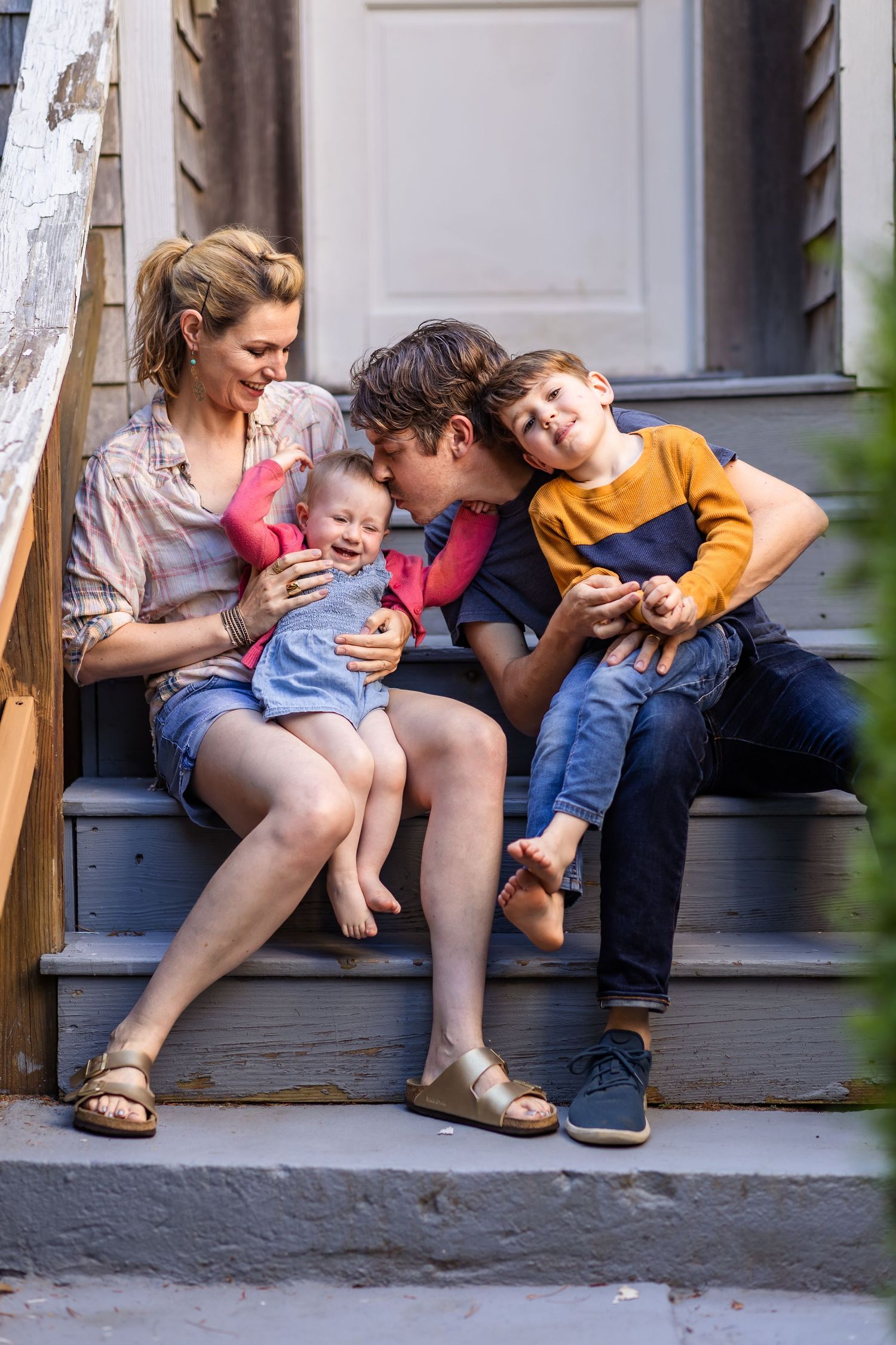Mom's shirt includes pink, yellow and blue, which ties together everyone's outfits.