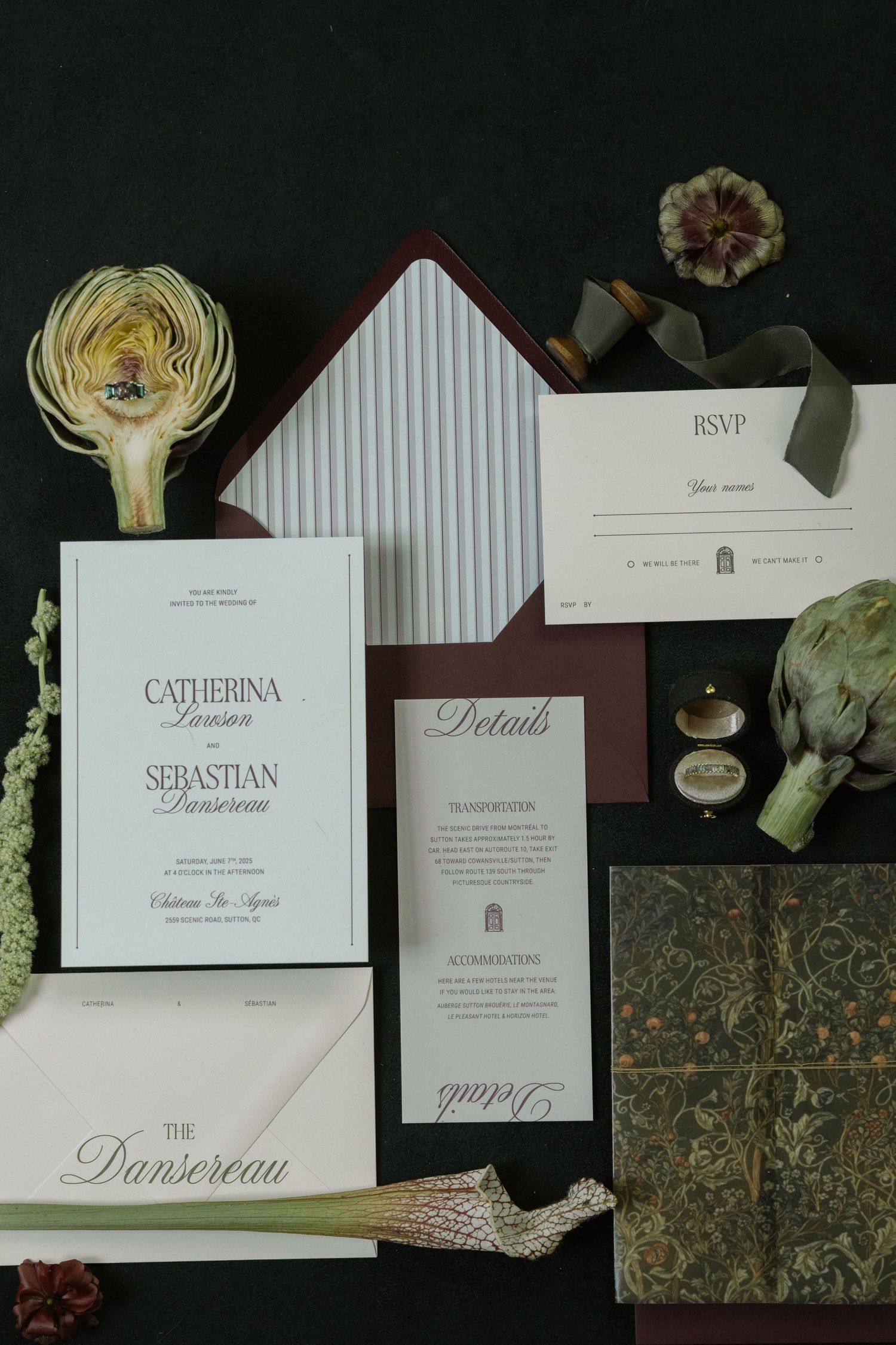 Elegant wedding invitation suite with traditional typography and floral elements on dark background.