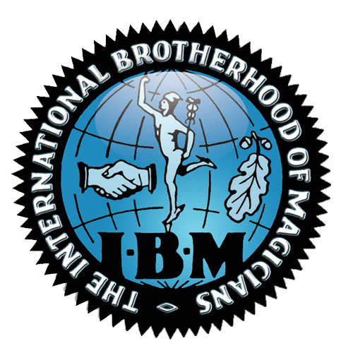 Official blue circular logo for The International Brotherhood of Magicians with handshake and performer icons.