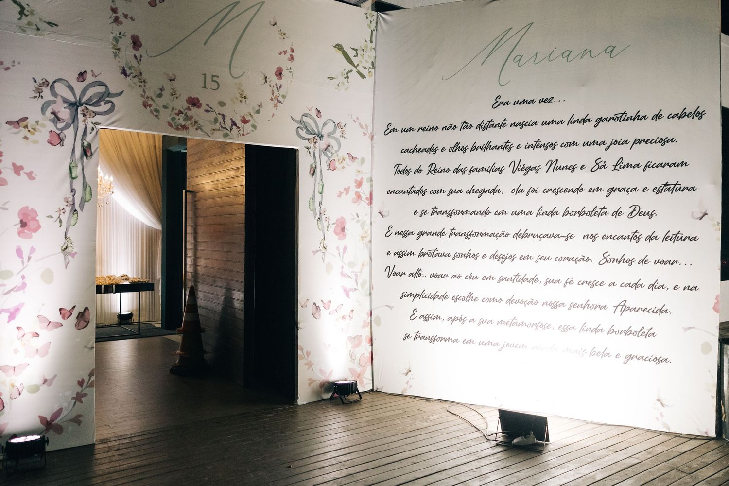 Elegant floral wallpaper and handwritten quote design in wedding venue.
