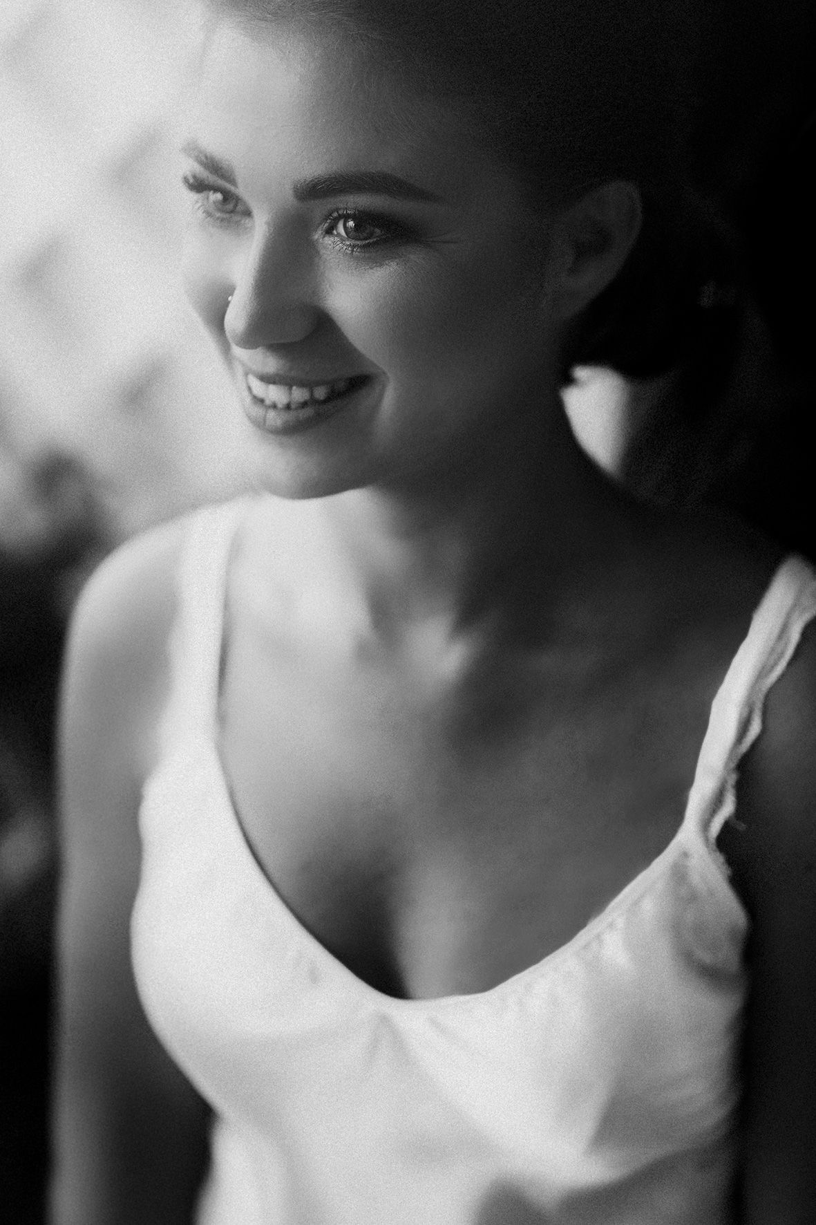Classic black and white portrait of a bride showing natural beauty and joy.