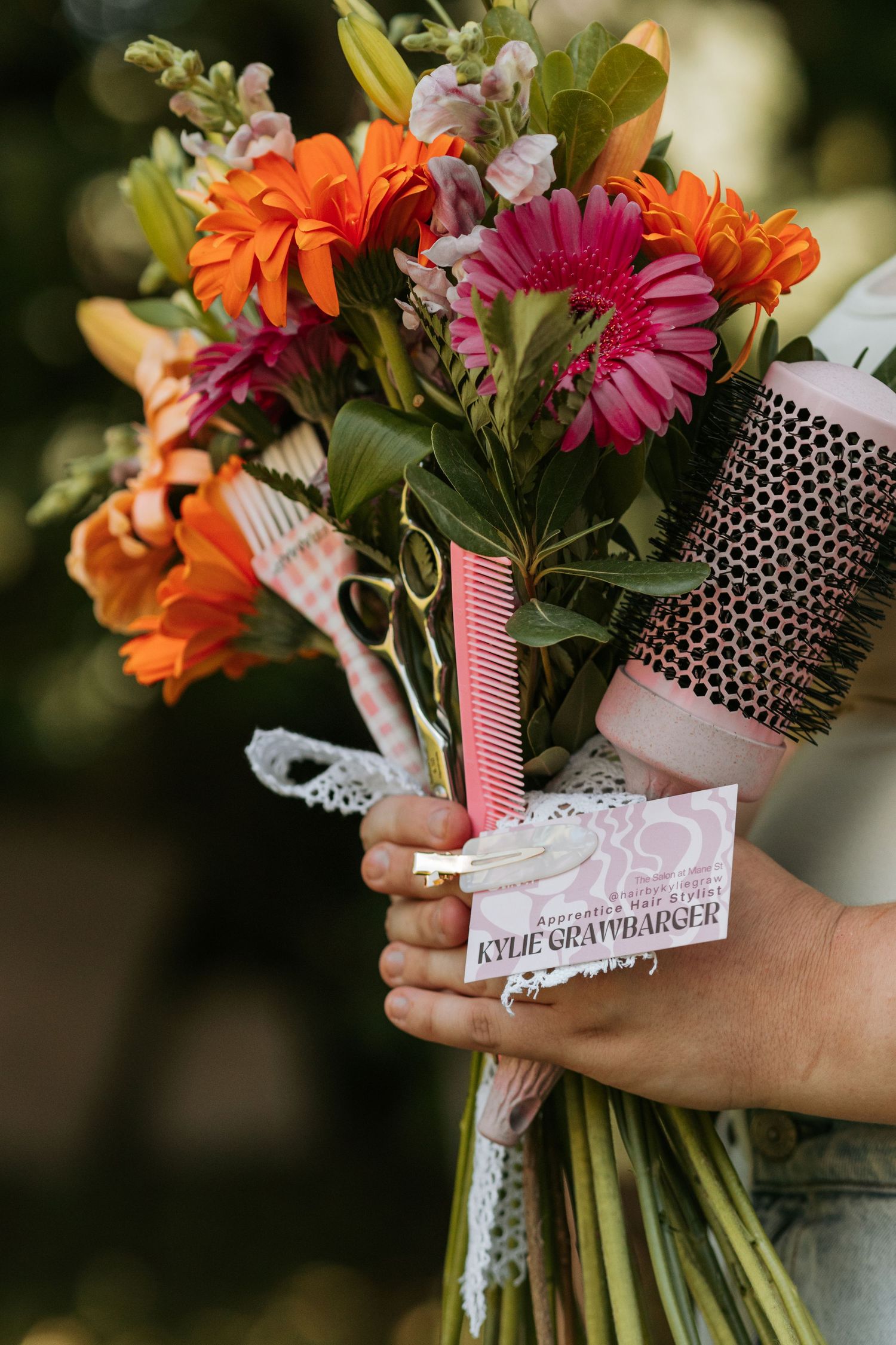 Close-up series showing colorful flowers with orange gerberas and pink blooms being wrapped in polka dot and striped ribbon.