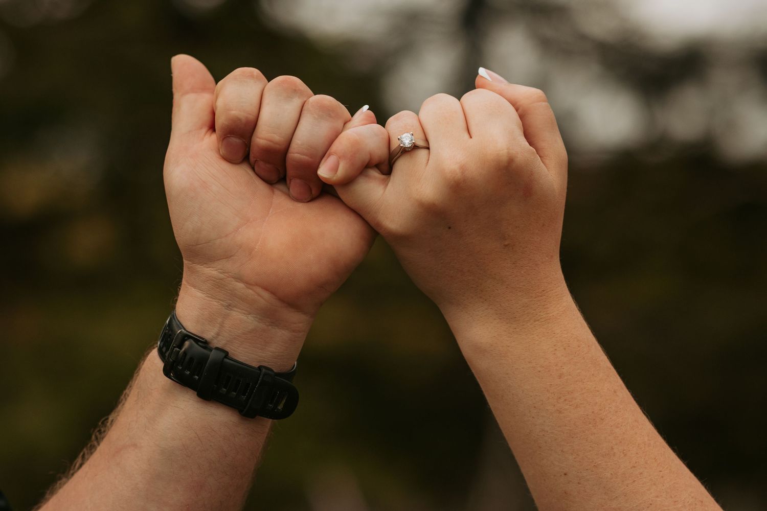 Seven sequential photos show hands making thumbs up gestures in diverse outdoor settings at sunset.