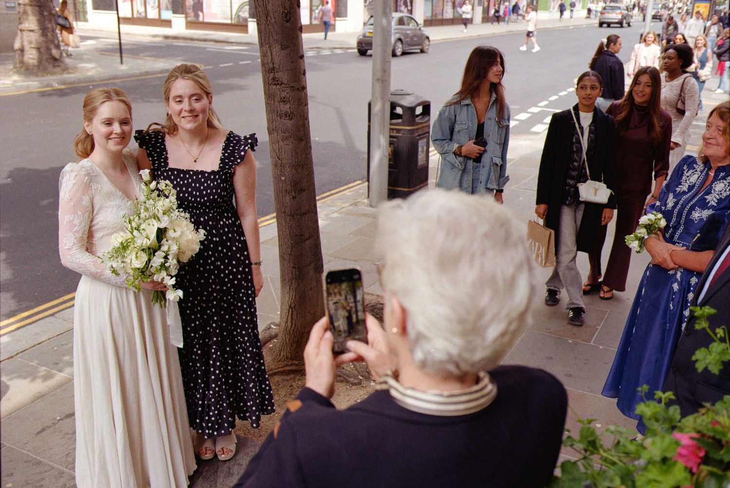 Wedding party members gathered outside a church entrance in a candid sequence of photos.