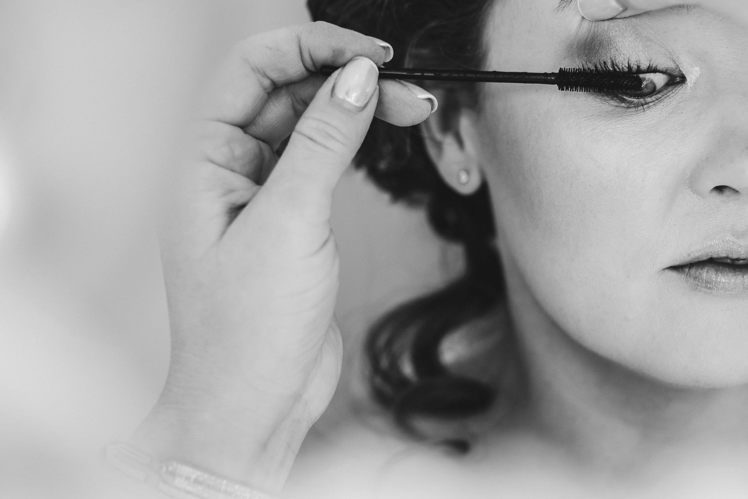 Close-up shots of makeup application and beauty preparation.