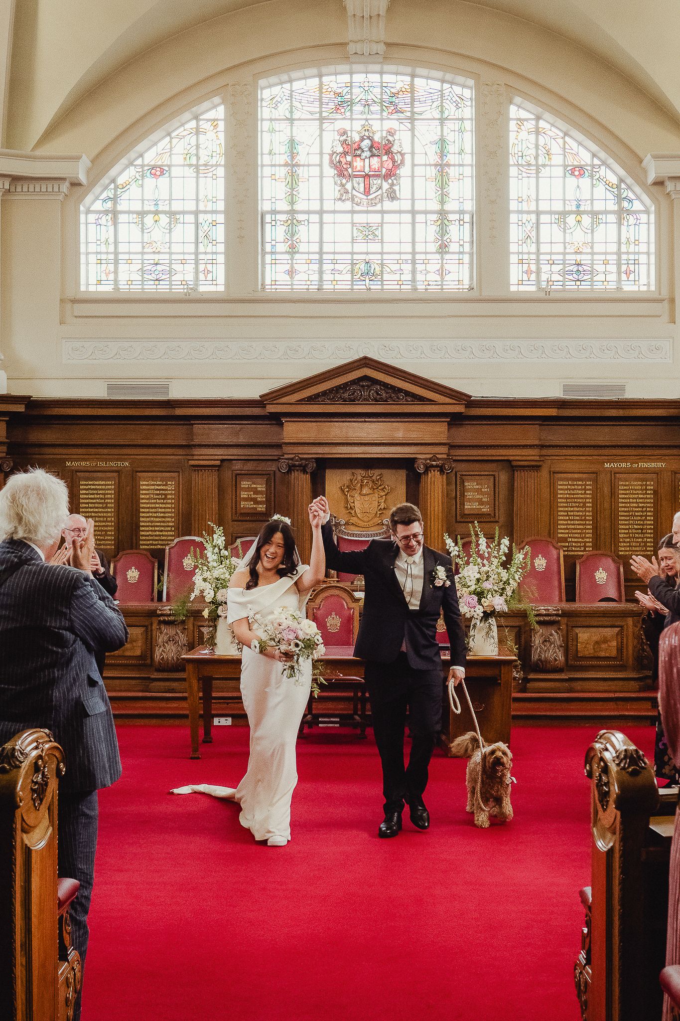 Panoramic sequence of a church wedding ceremony with stained glass windows and red carpet in an elegant sanctuary setting.