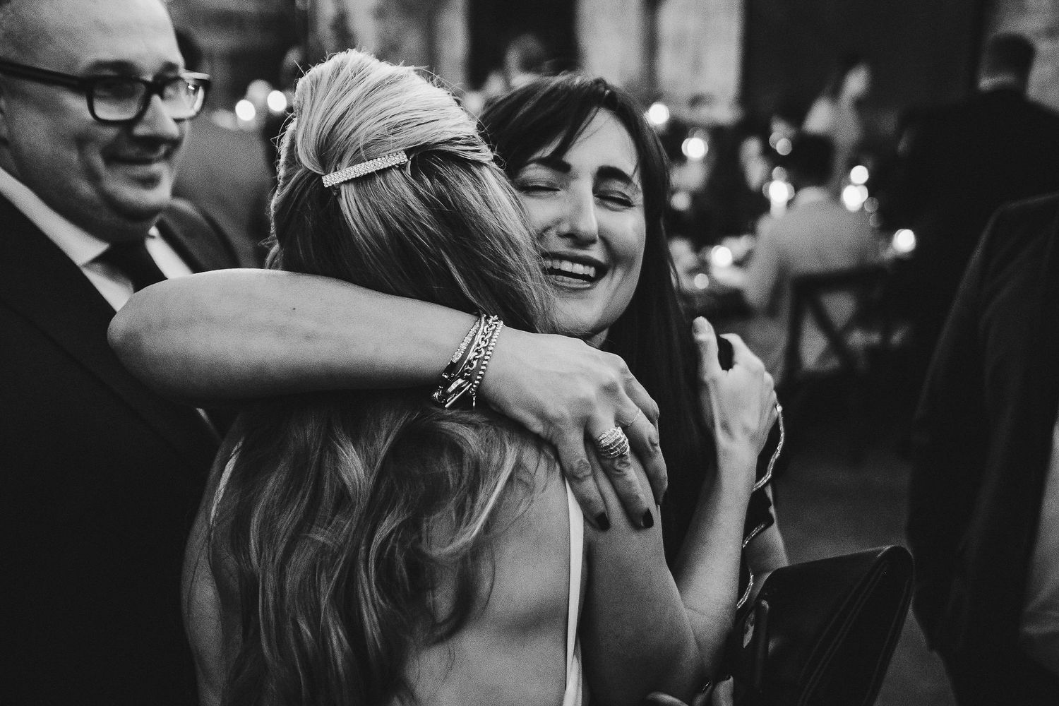 Candid black and white photographs show guests enjoying themselves at a festive party.