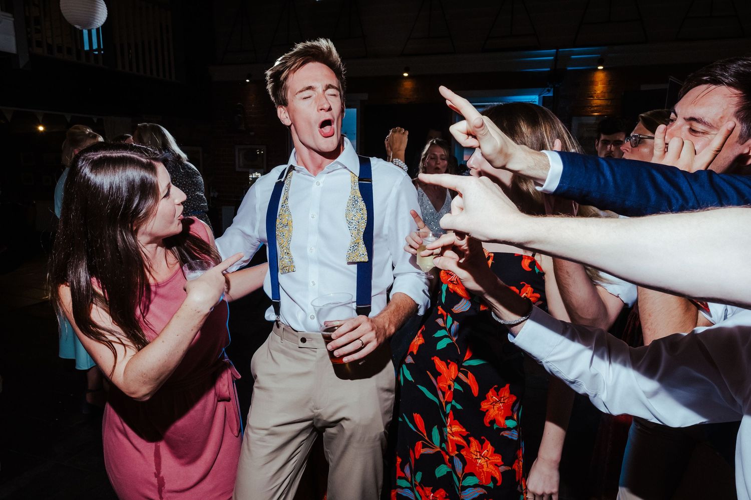 Partygoers enjoying an energetic dance floor moment at The East Quay in Whitstable
