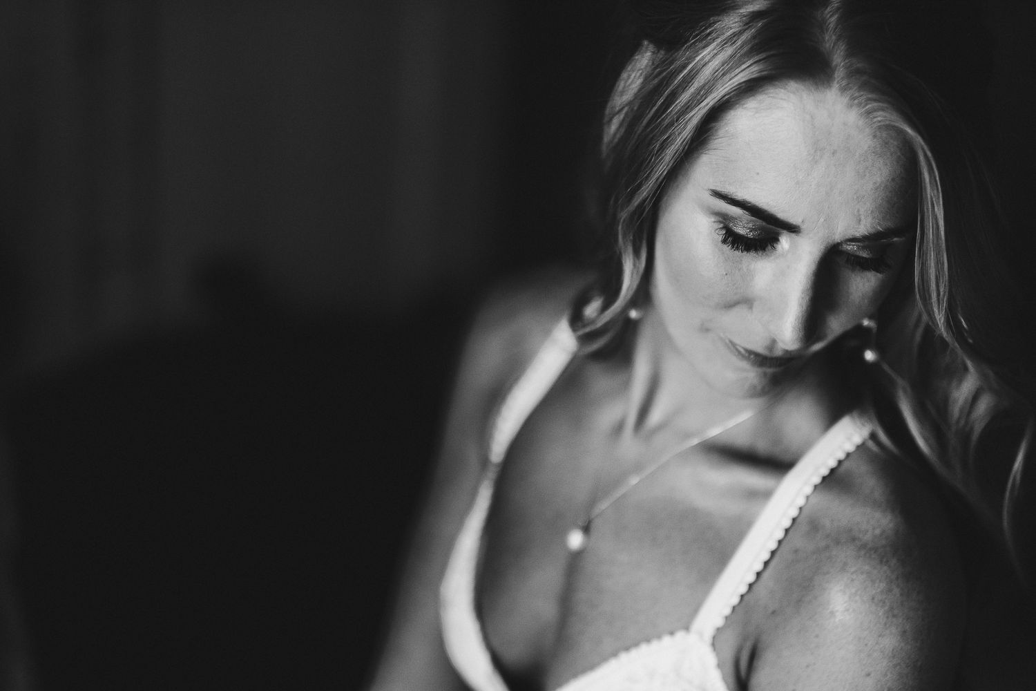 Artistic black and white bridal portrait series showing subtle emotional expressions.