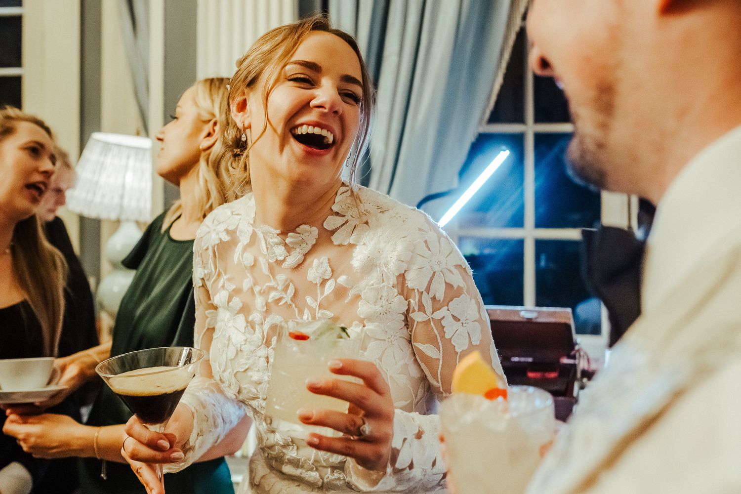 Candid moments of joy and celebration captured during an intimate wedding reception.
